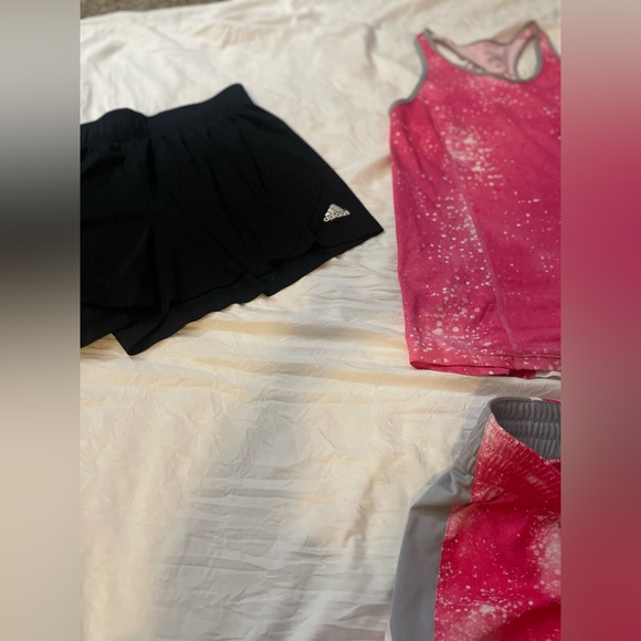 One pair of Adidas, running shorts, large, and one Nike short set, medium - Picture 6 of 9